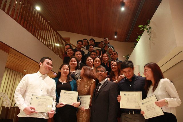 2016 CHEVENING SCHOLARS. Ambassador Asif Ahmad pose with 26 Filipinos who are awarded Chevening Scholarships to study in the UK. Photo by British Embassy Manila  