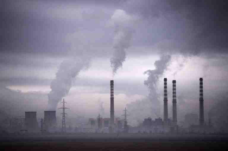 This file photo taken Feb 14 2013 shows shows smokes rising from stacks of a thermal power station in Sofia, Bulgaria. AFP / Dimitar Dilkoff 