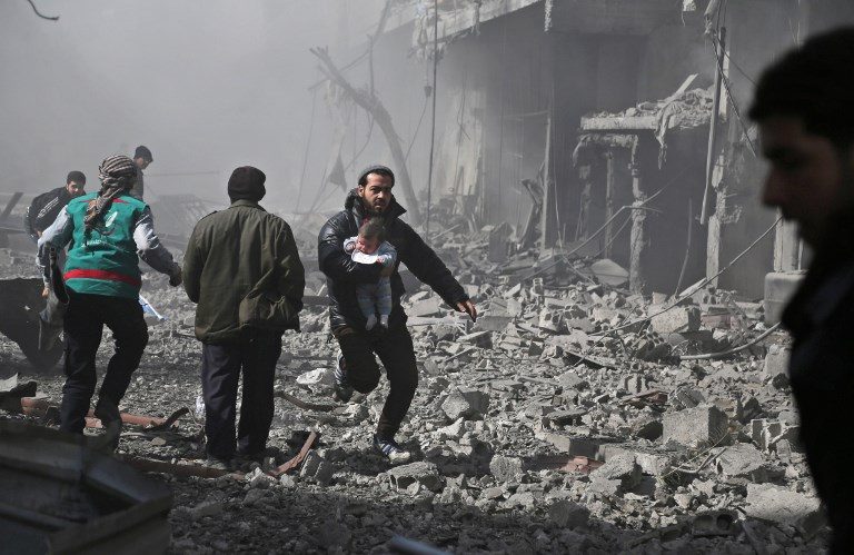 77 dead as Syria enclave pounded ahead of expected ground assault