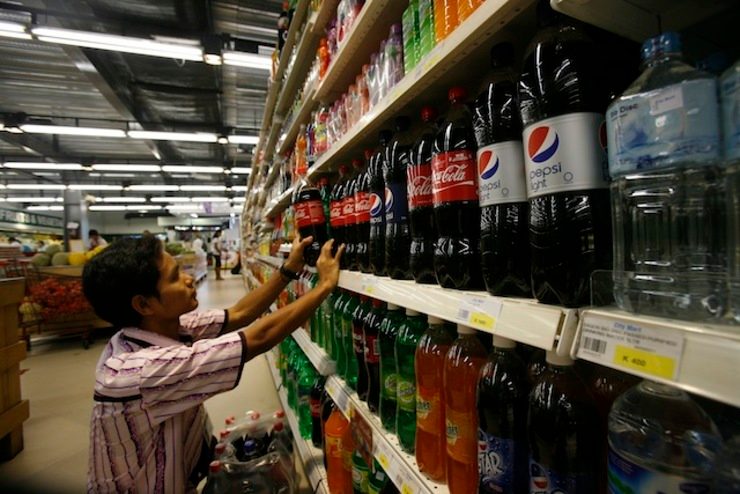 US beverage giants vow to cut calories to fight obesity