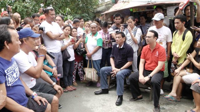 Duterte-Cayetano listen to UP street vendors