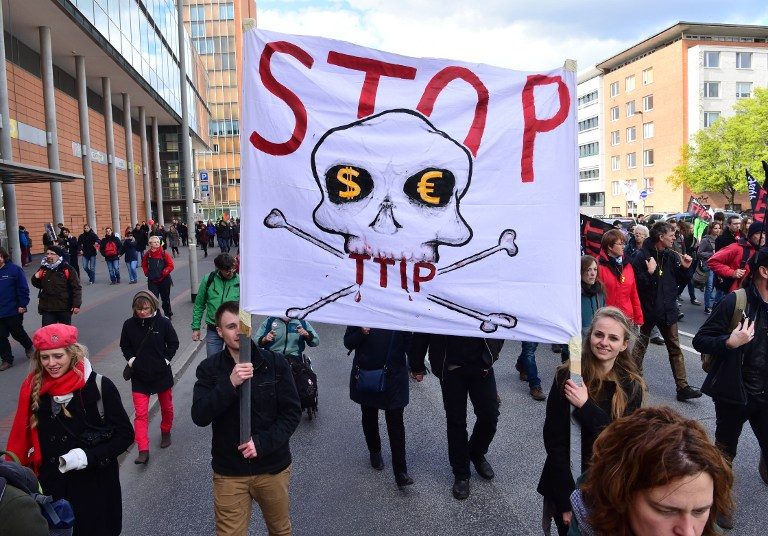 Thousands rally in Germany against trade deal on eve of Obama visit