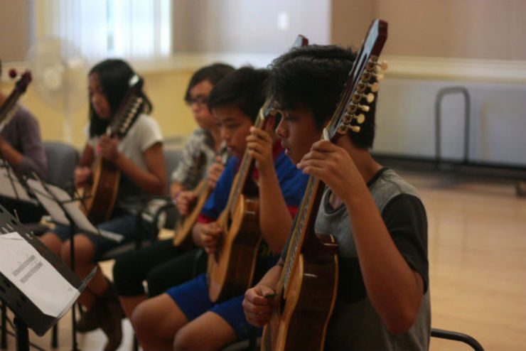 RONDALLA. Interested students can start learning instruments for the Rondalla at an early age. Photo by Jessica Mendoza 