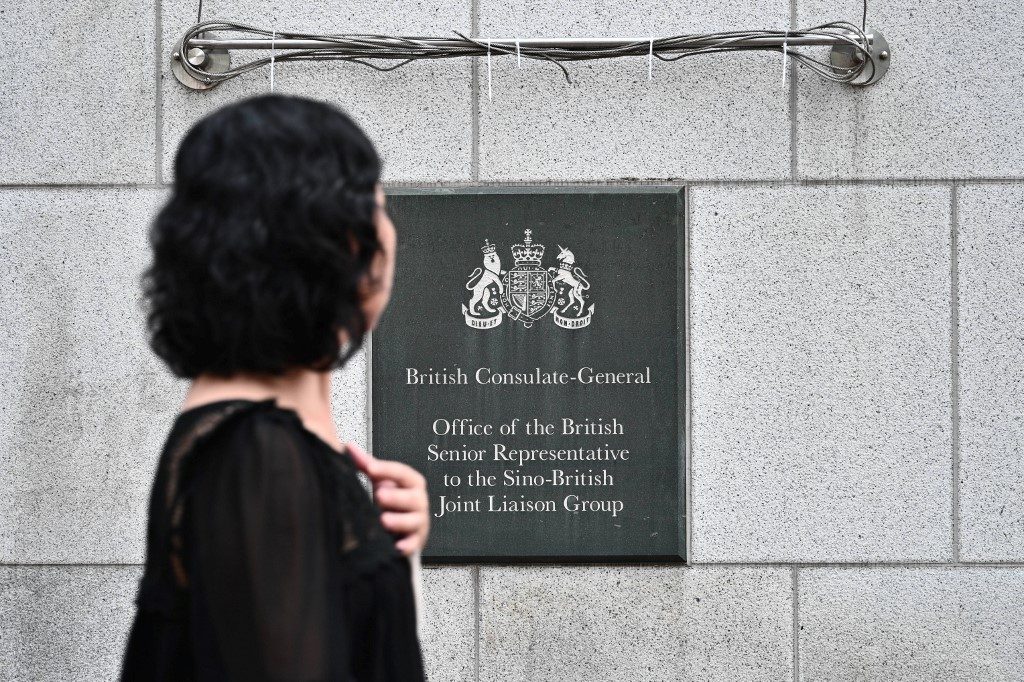 Missing employee of UK consulate in Hong Kong detained – family