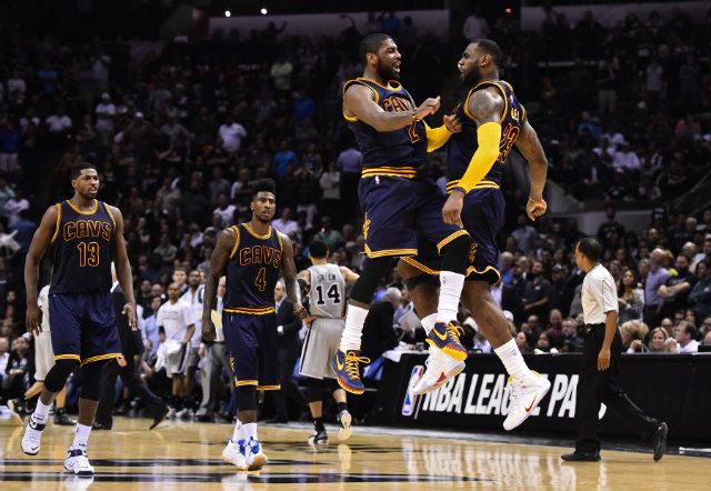 Kyrie Irving was an All-NBA Third Team selection this season while LeBron James was a First Team selection. Photo by Larry W. Smith/EPA 