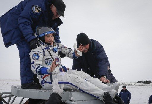 Astronauts land from ISS stint marred by air leak, rocket failure