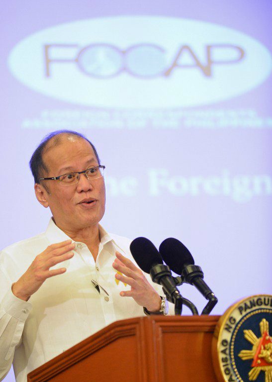 ‘MAKE AMENDS.’ President Benigno Aquino says the Marcoses must apologise for the horrors of martial law. Aquino speaks at the Foreign Correspondents Association of the Philippines (FOCAP) forum in Manila. Photo by Ted Aljibe/AFP 