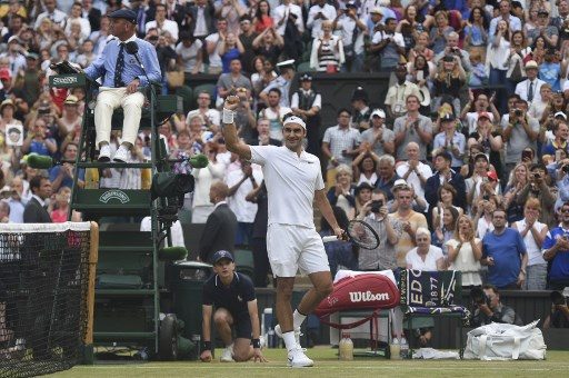 Federer, Djokovic march on at Wimbledon