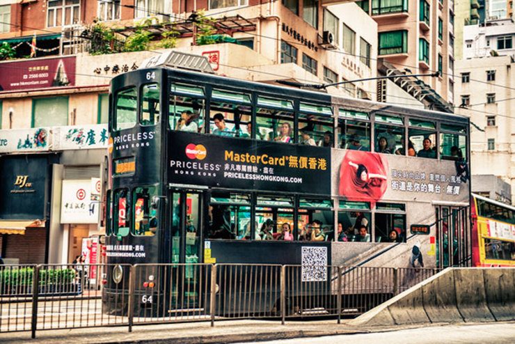 DOUBLE-DECKER. Double-decker buses, like those buses or trams in Hong Kong as seen in this photo, are better alternatives to transport more people in a single public utility vehicle (PUV). Hong Kong tram image from Shutterstock