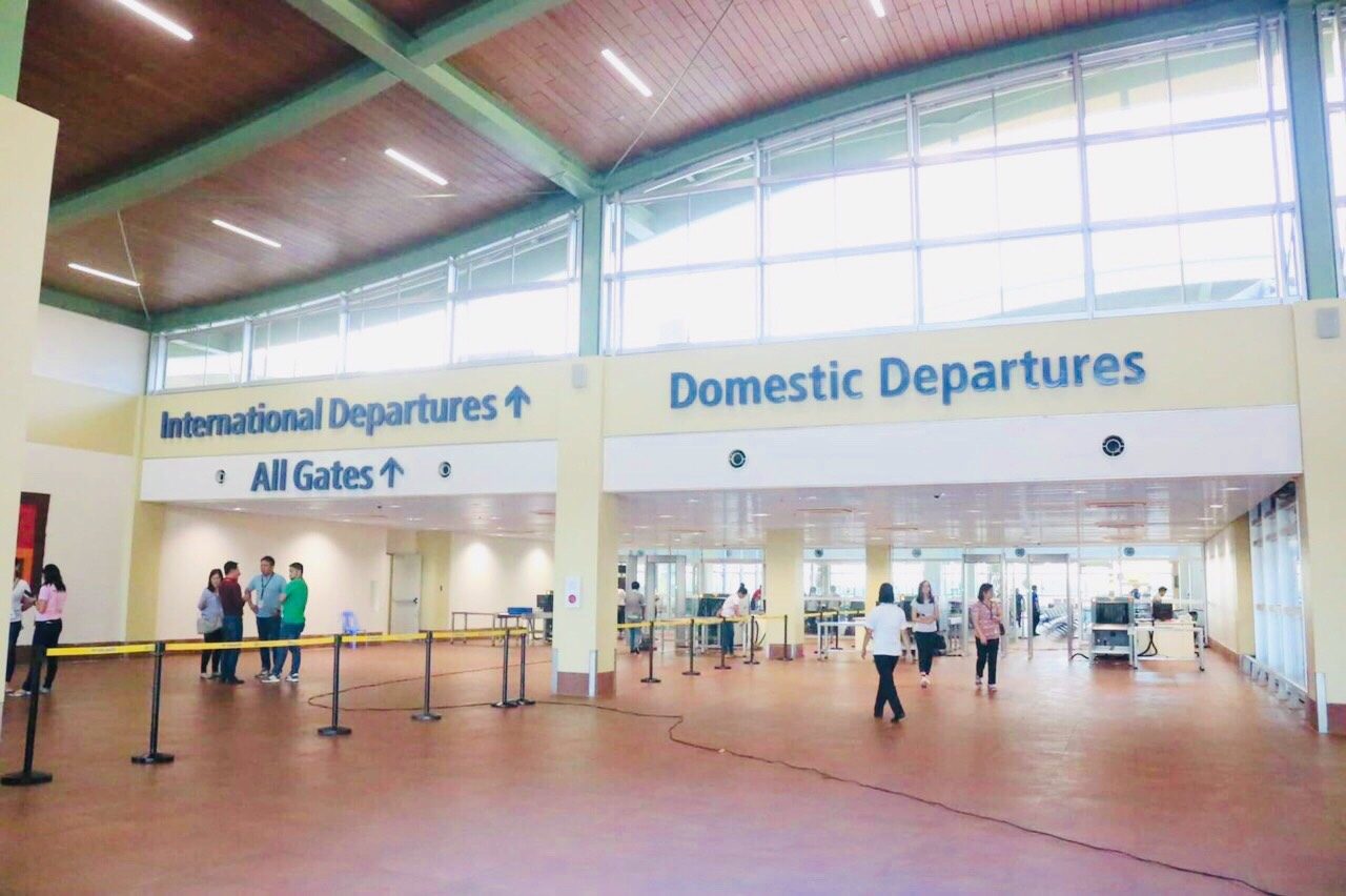 DEPARTURE. Hallways for international and domestic departures. 