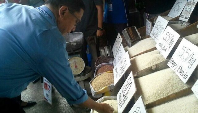 INSPECTION. NFA Administrator Renan Dalisay checks a rice store in Metro Manila on June 30, 2015. Photo by NFA 