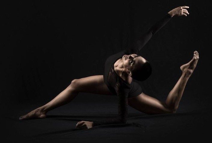DANCE. A performer from Daloy Dance Company who gracefully demonstrates flexibility and extensions. 