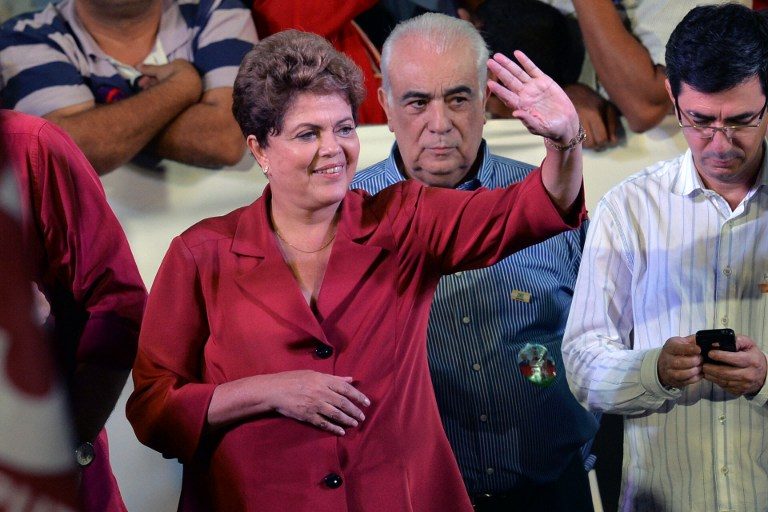 Brazilian President Dilma Rousseff waves during a campaign rally in Sao Paulo Brazil on September 29, 2014. Nelson Almeida/AFP