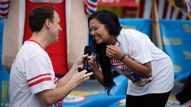World hot dog eating champ wins again, proposes marriage
