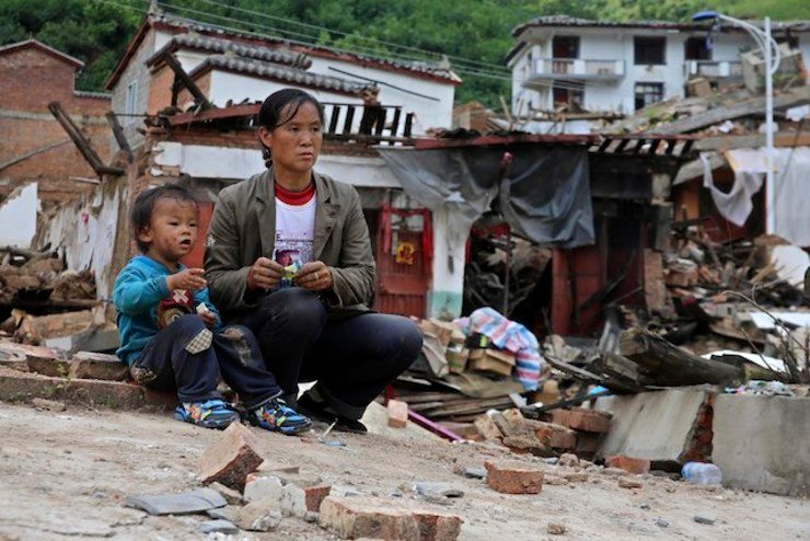 China quake toll nears 600, volunteers told to stay away