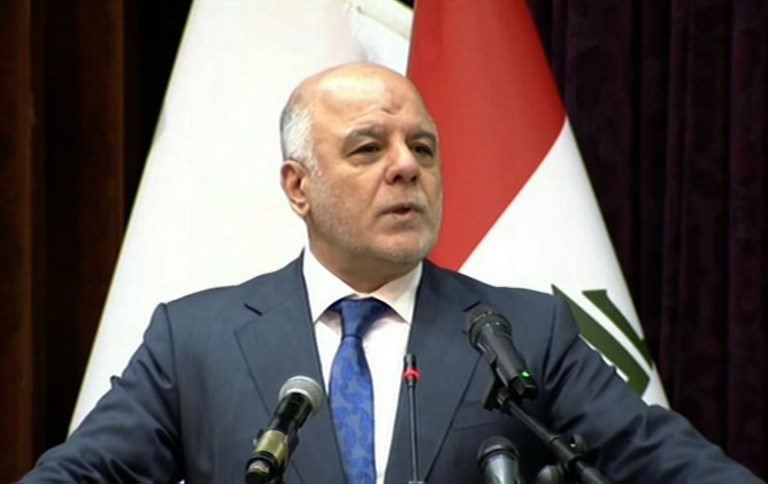 Iraq PM warns armed groups against stockpiling weapons