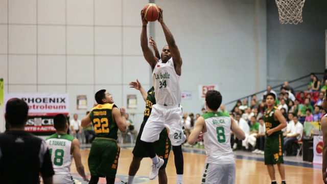 ATHLETICISM. Mbala (middle, in white) affects the game both on offense and defense with his athletic prowess. File photo by Josh Albelda/Rappler  