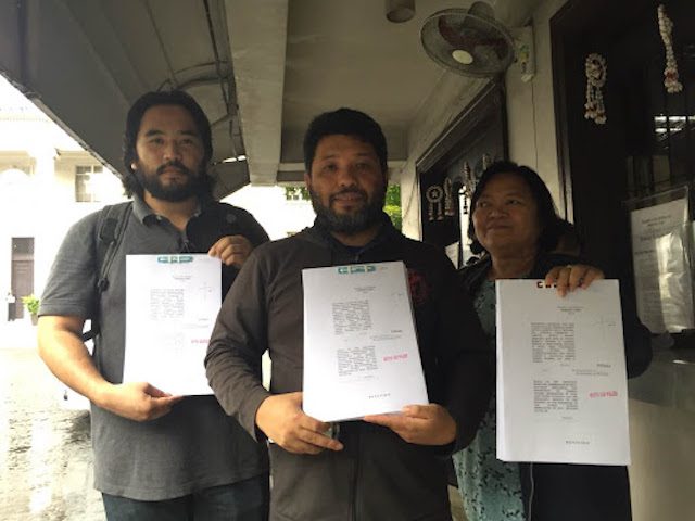FILED. Axle Simeon, Romel Bagares, and Rebecca Desiree Lozada from the Philippine Coalition for the International Criminal Court (PCICC) file a petition asking the Supreme Court to void President Rodrigo Duterte’s withdrawal from the ICC. Photo by Lian Buan/Rappler  