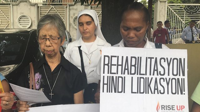 RISE UP. Church-based groups organize themselves to form an organization to protest the killings and human rights violations. Rappler photo   