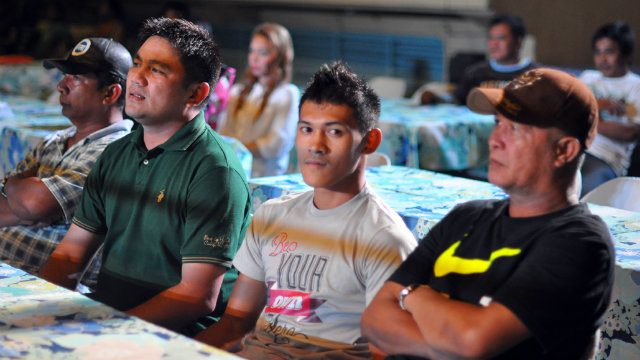 Dexter 'Wangyu' Tan (green shirt) and Harmonito Dela Torre (staring at camera) attending the Sanman promotion. Photo by Edwin Espejo