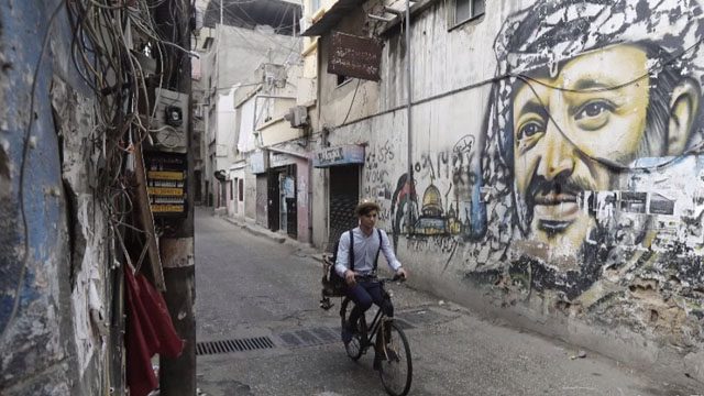 Beirut’s dapper barber-on-a-bike offers curbside cuts
