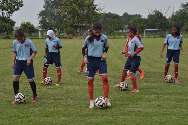 PRACTICE. Female members of the Blue Eagle football club during training in Jakarta. Photo by Adek Berry/AFP 