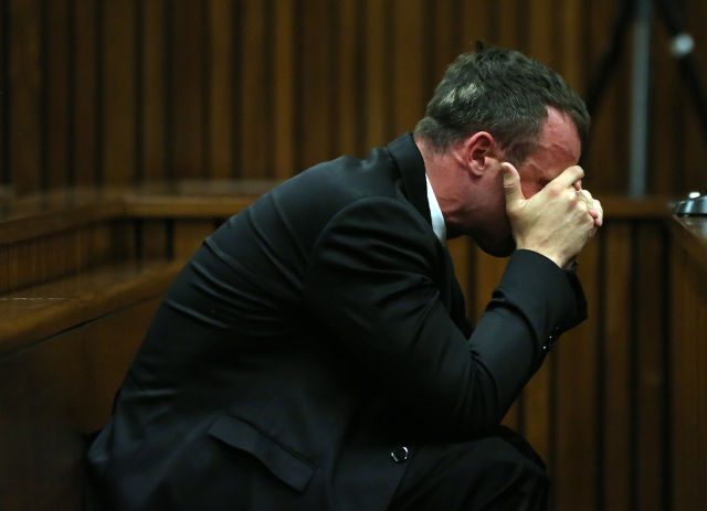 PISTORIUS WEEPS. South African Paralympic athlete Oscar Pistorius is seen during his trial at the North Gauteng High Court, Pretoria, South Africa, 07 April 2014. Thema/Hadebe/EPA