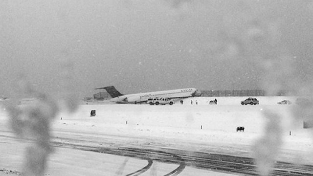 Airliner skids off La Guardia runway as winter storm hits US