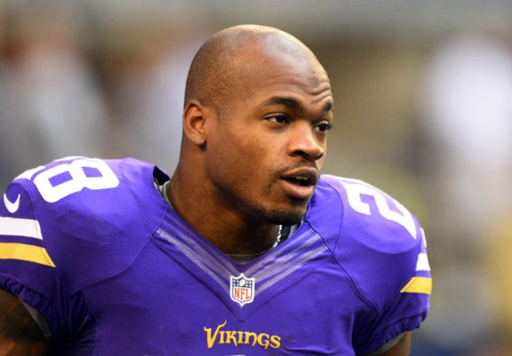 Adrian Peterson was charged with child abuse for hitting his son with a 'switch.' File photo by Larry W. Smith/EPA
