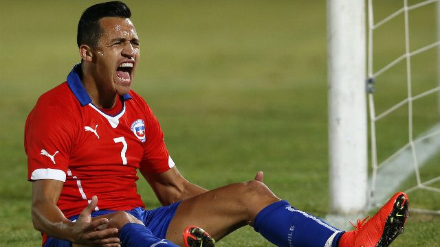 Alexis Sanchez of Chile reacts during a friendly match against Egypt prior to the 2014 FIFA World Cup in Brazil. Photo by Felipe Trueba/EPA