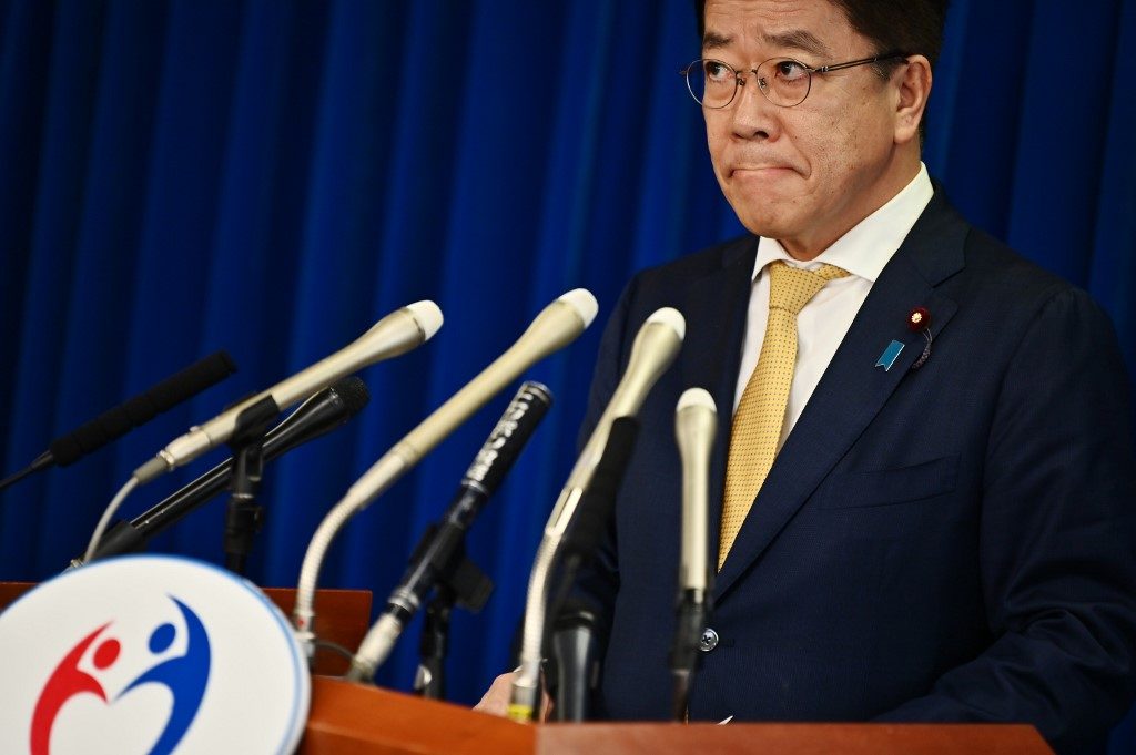 Dozens allowed off Japan virus-hit ship have ‘symptoms’ – minister