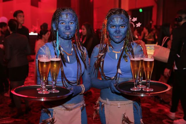 IN THEME. Servers pose for the camera in the Avatar inspired costume.  Photo courtesy of Marriott Manila  