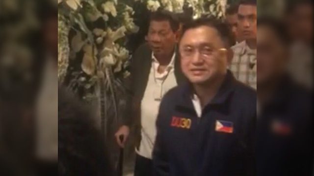 Cane-bearing Duterte visits Nene Pimentel wake