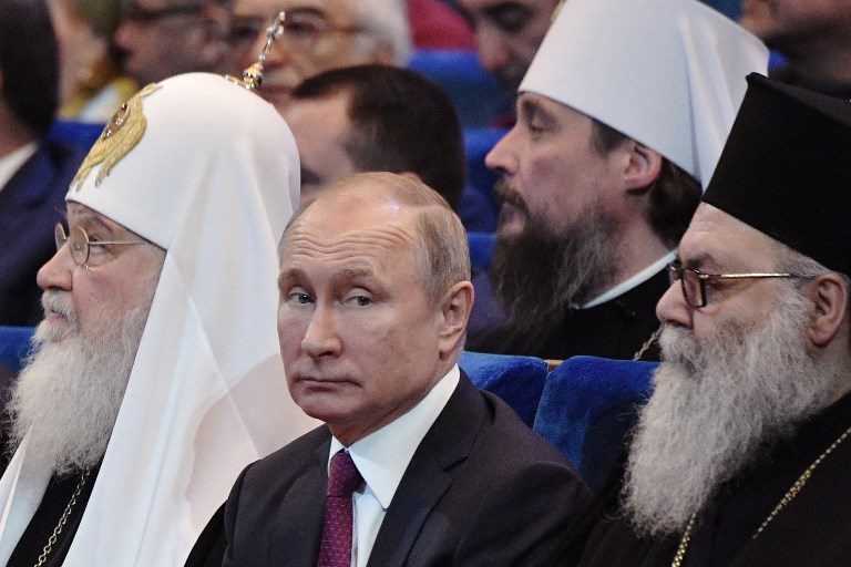 Putin proposes to enshrine God, heterosexual marriage in Russian constitution