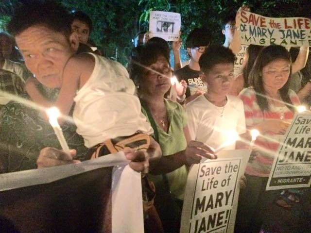 PRAYERS FOR MARY JANE. Hoping Mary Jane will be saved from the Indonesian death row, the Veloso family joins a prayer vigil on Monday night, April 6, in Manila. Photo by Migrante International 