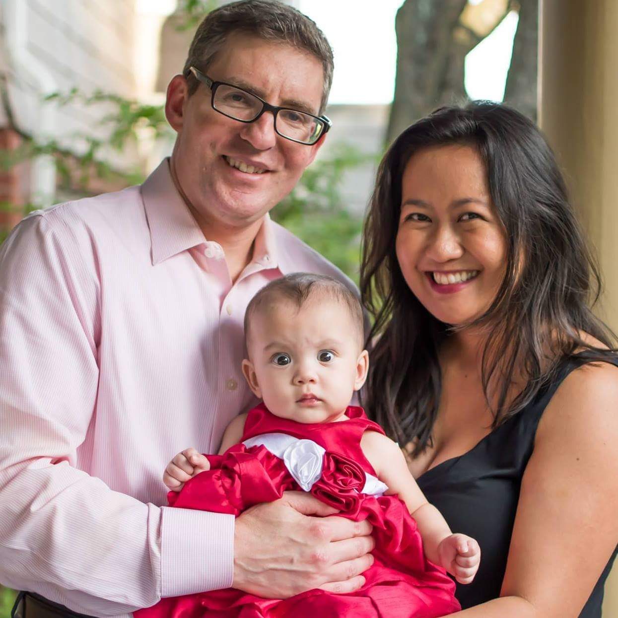 The author (R) with her American husband and baby. 