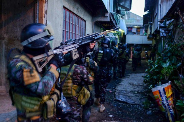RAID. Special Action Force commandos raid the house of Ozamiz City Councilor Rizalina Francisco. File photo by Bobby Lagsa/Rappler 