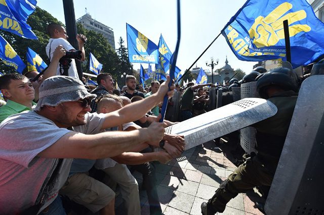 Deadly clashes in Kiev over rebel legislation