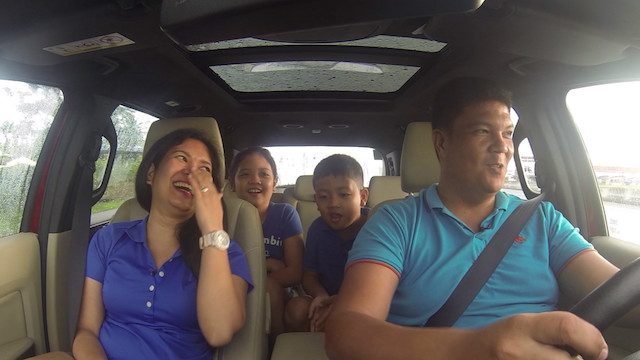 ALL SMILES. The Bonifacio family enjoying the drive on the way to their first stop 