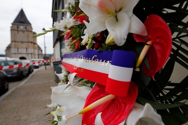 France aims to ease religious fears after church attack