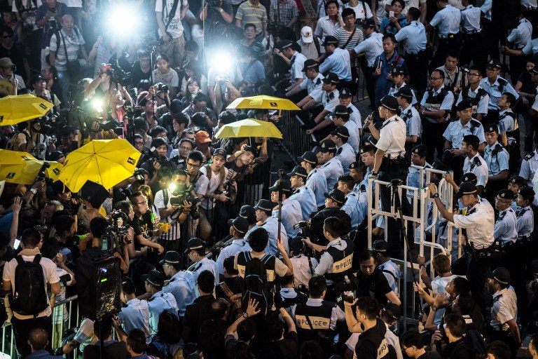 Tensions flare in Hong Kong, a year since mass rallies