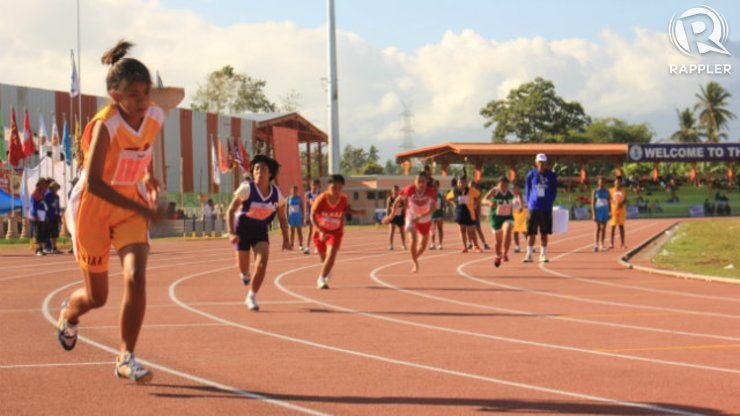 A girl from Zamboanga Peninsula builds a big lead in the Special Games 200m run. Photo by Maan Tengco/Rappler
