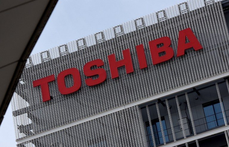 Toshiba net profit up on chip business sale