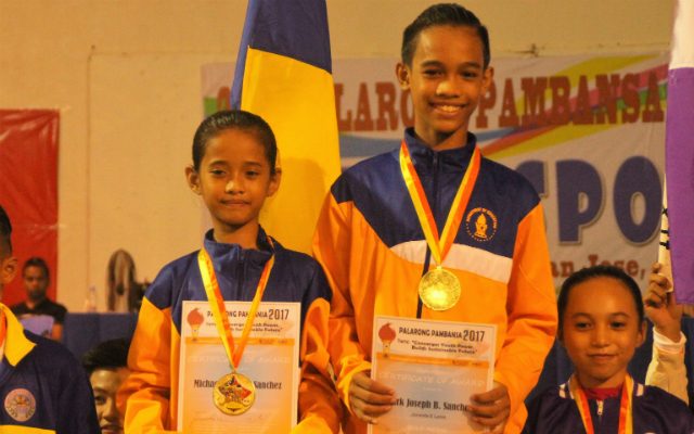 DOMINATION. Michaela Jane Sanchez and Mark Joseph Sanchez receive their first gold medal in the dancesport juvenile elementary Latin category.  