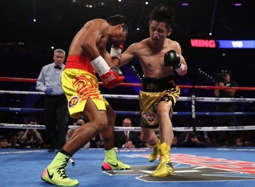 DOMINANCE. Zou Shiming had a walk – and sometimes dance – in the park against his overmatched Thai foe. Photo by Christian Petersen/Getty Images/AFP  