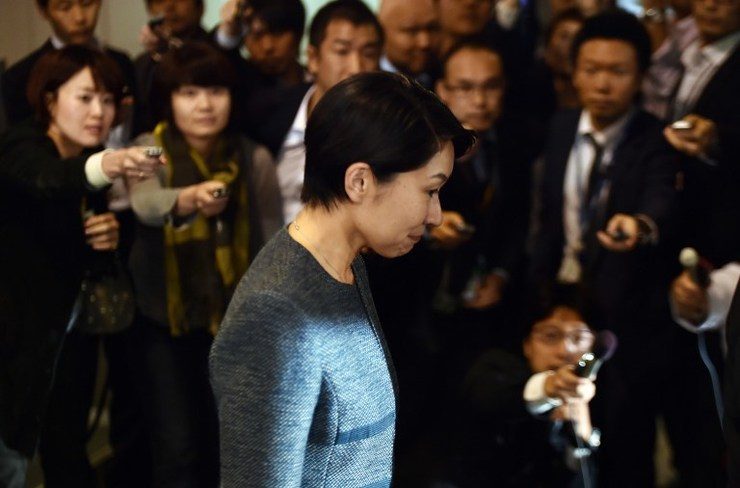 Japan PM Abe loses two female ministers over cash scandals