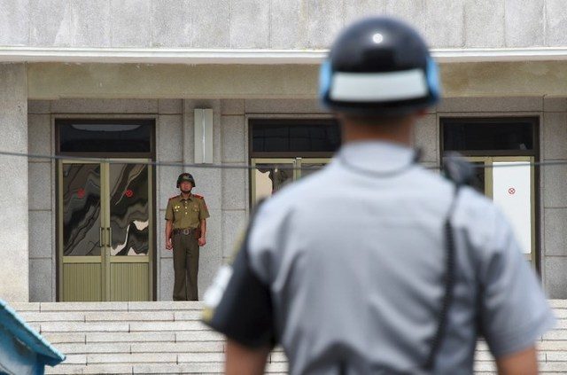 Two Koreas agree to remove some border guard posts