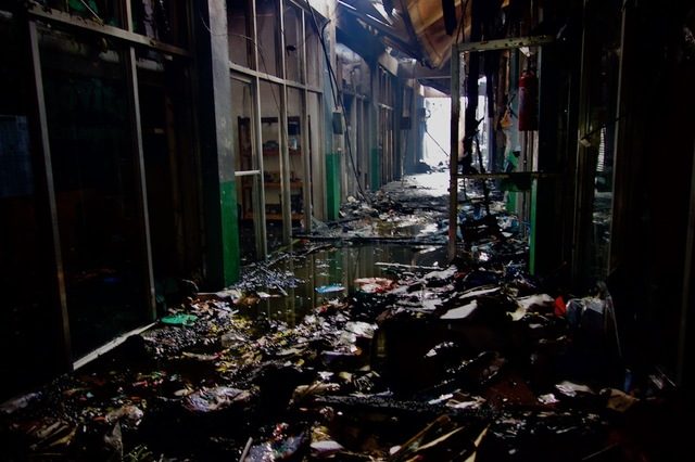 WHAT'S LEFT. The aisle of the UP Shopping Center after a fire on March 8, 2018. Photo by Rambo Talabong/Rappler 