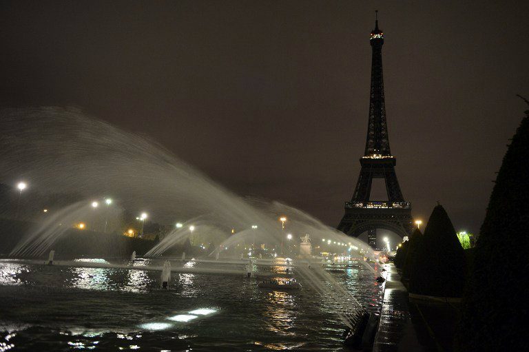 MOURNING CITY. A picture taken on November 14, 2015 shows the Eiffel Tower with its lights turned off following the deadly attacks in Paris. Islamic State jihadists claimed a series of coordinated attacks by gunmen and suicide bombers in Paris that killed at least 129 people. Photo by Alain Jocard/AFP 