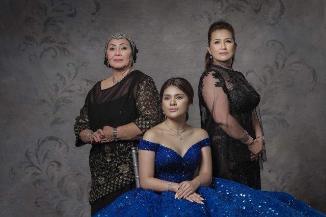 WEALTHY FORMER IN-LAWS. Lovelie Sangkola Sumera (right) poses with her daughter Isabelle (seated) during her debut. Photo by Lito Sy from Sangkola's Facebook account  
